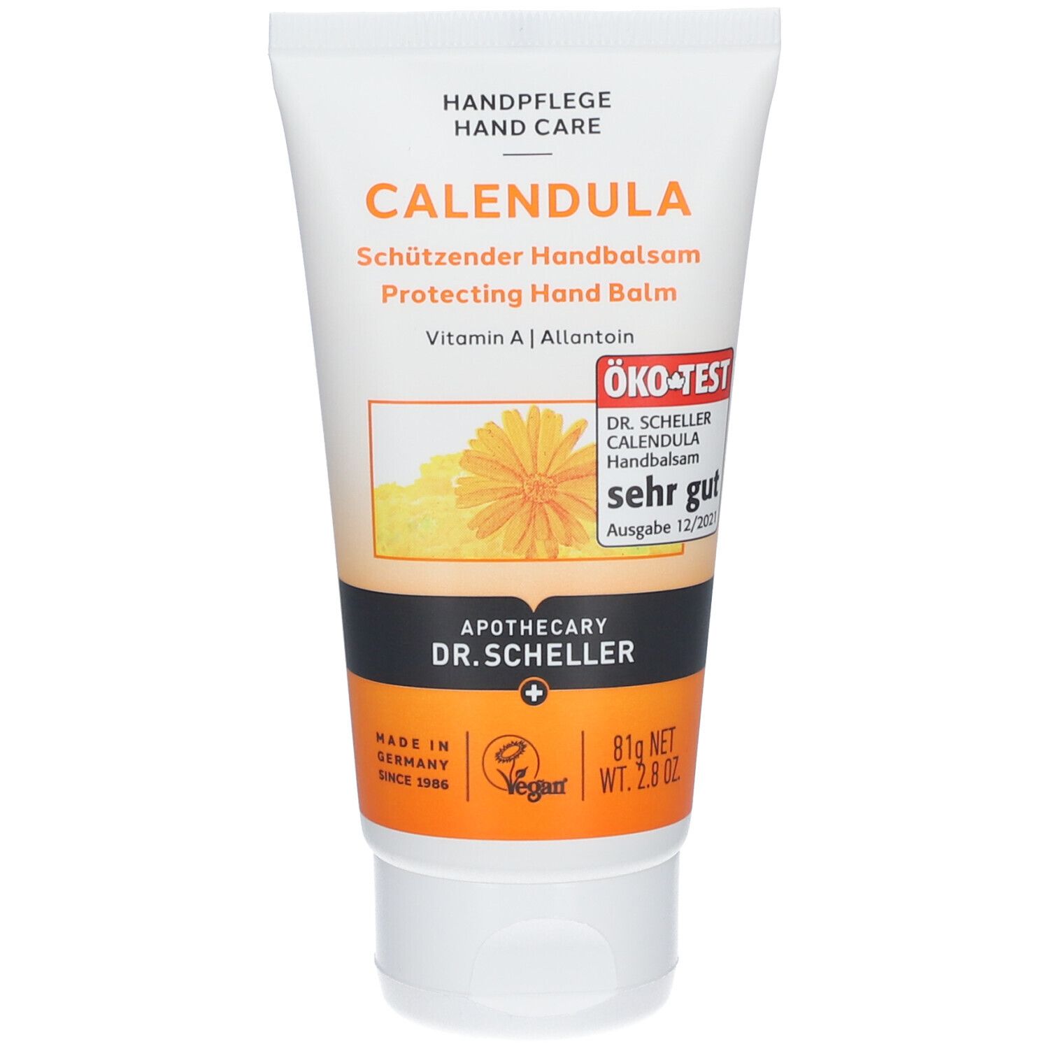 Witte tube CALENDULA handbalsem met ÖKO-TEST keurmerk. Oranje afbeelding met bloem. Zwarte band met apotheeklogo.