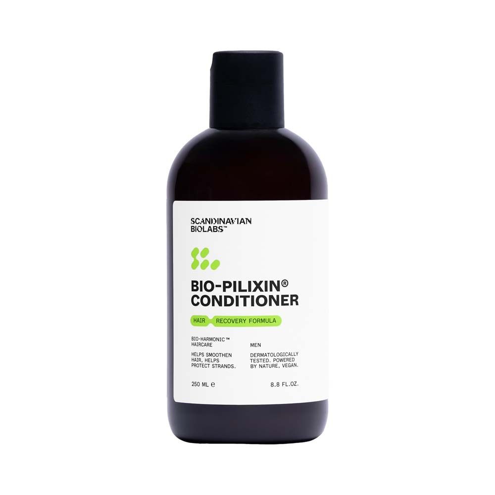 Bruine fles met zwarte dop. Opschrift BIO-PILIXIN Conditioner. Merk: Scandinavian Biolabs. 250 ml.
