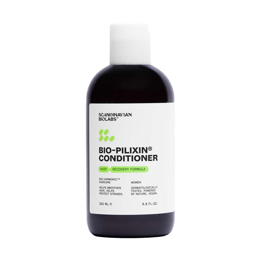 Donkere fles met witte dop. Opschrift: Bio-Pilixin Conditioner. Groen-witte grafiek. 250 ml.