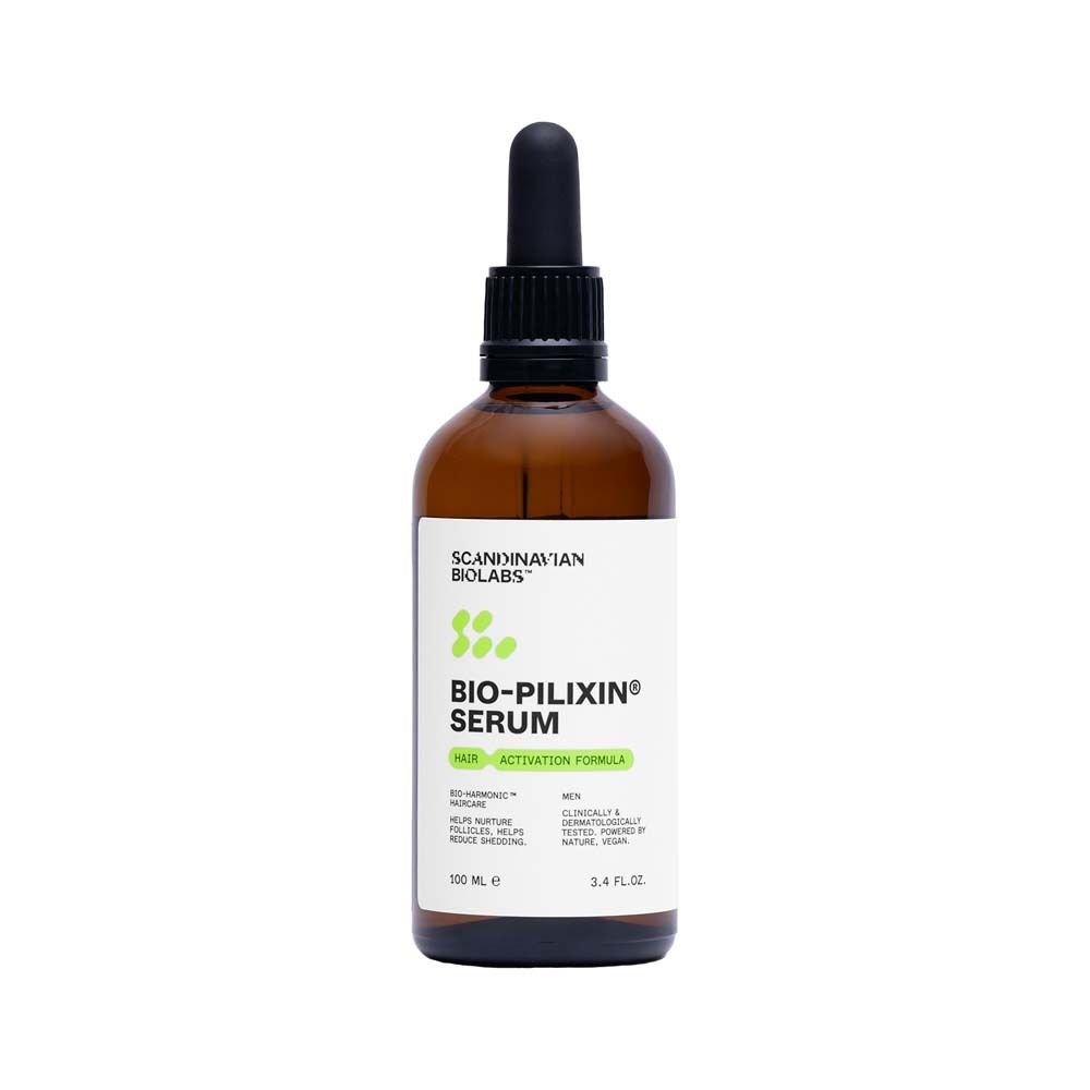 Bruine fles met serum. Opschrift: BIO-PILIXIN Serum. Voor mannen.