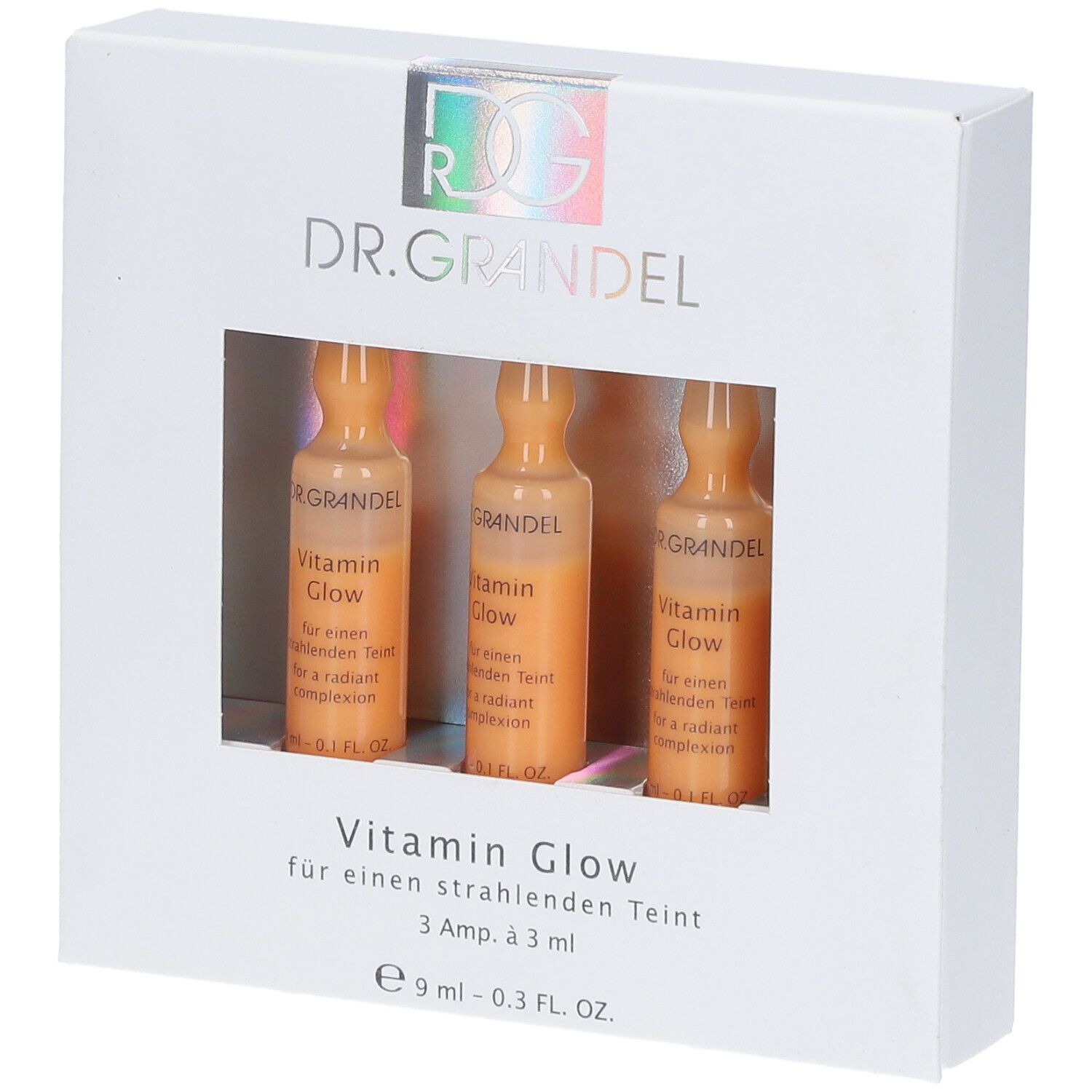 Boîte blanche avec trois ampoules. Fenêtre montrant un liquide orange. Inscription : Vitamin Glow.