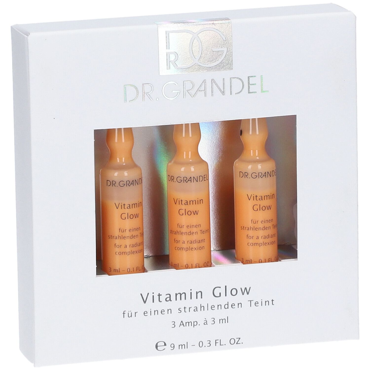 Boîte blanche avec trois ampoules. Fenêtre montrant un liquide orange. Inscription : Vitamin Glow.