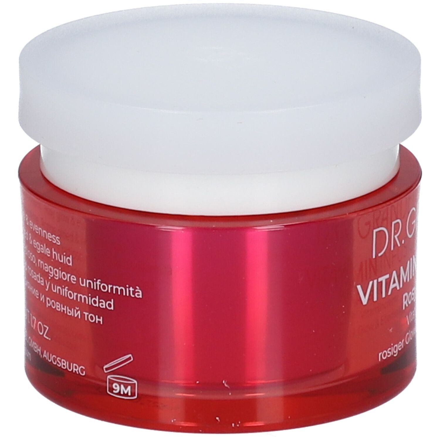 Pot rouge avec couvercle blanc. Inscription: DR. GRANDEL Vitamin Infusion Rosy Cream. Texte en plusieurs langues.