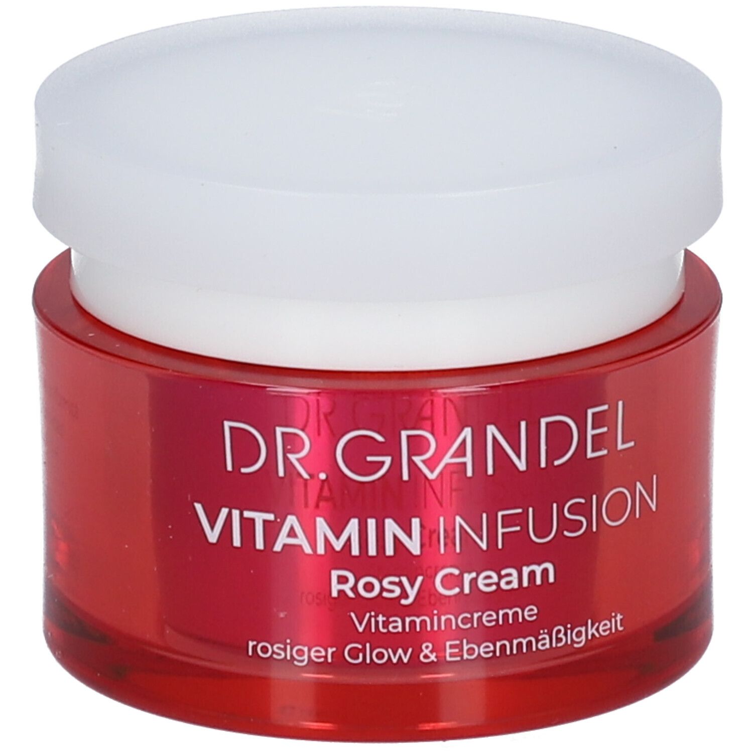 Pot rouge avec couvercle blanc. Inscription: DR. GRANDEL Vitamin Infusion Rosy Cream. Crème vitaminée pour un éclat rosé et uniforme.