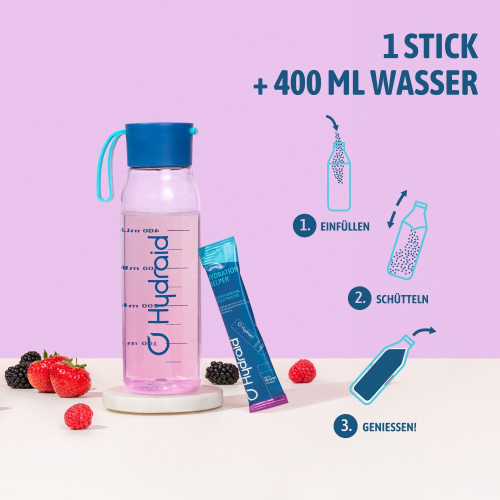 Hydraid fles, een stick en bessen naast bereidingsinstructies.