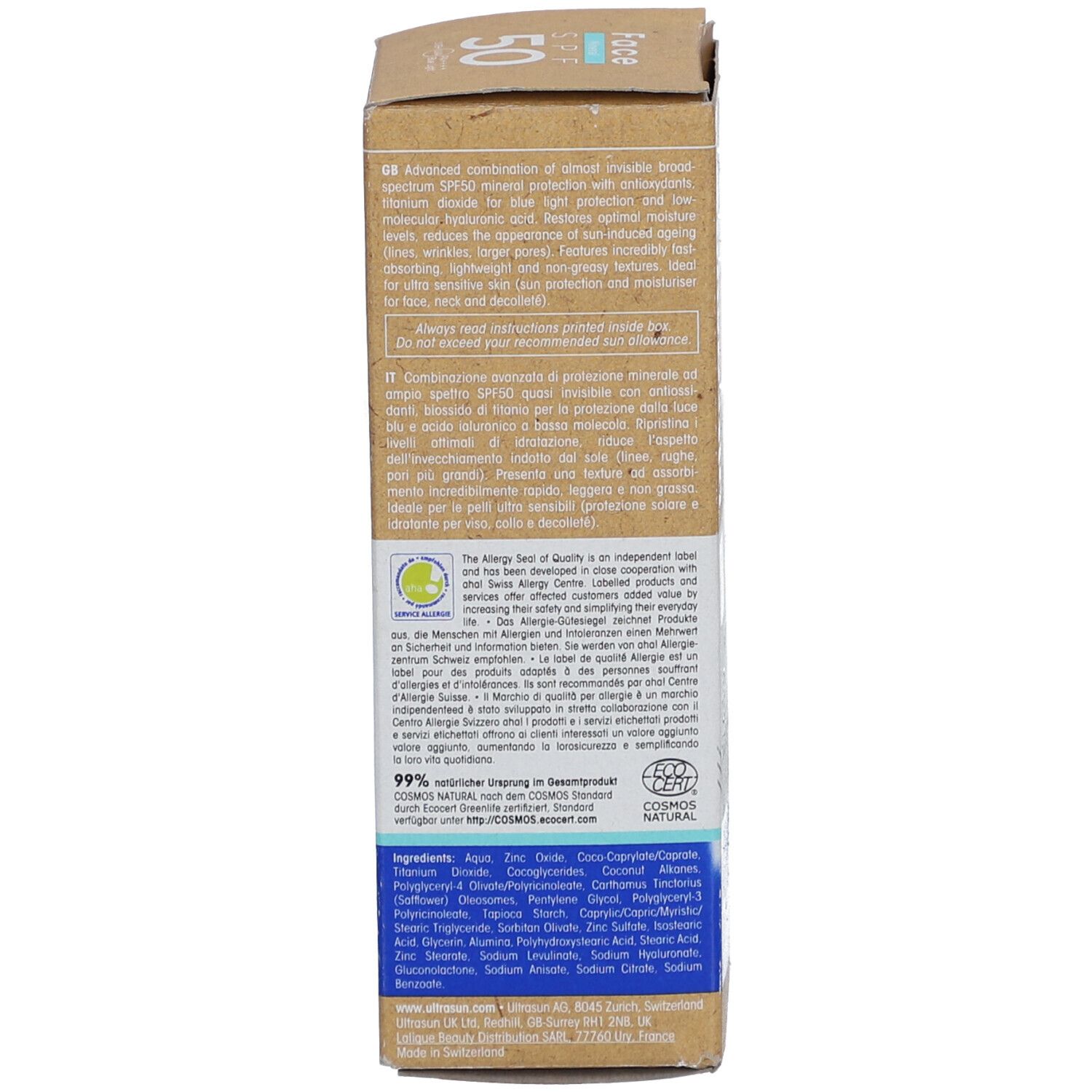 Achterkant van de kartonnen verpakking met tekst. Bevat informatie over ingrediënten en certificeringen. Met COSMOS NATURAL certificering.