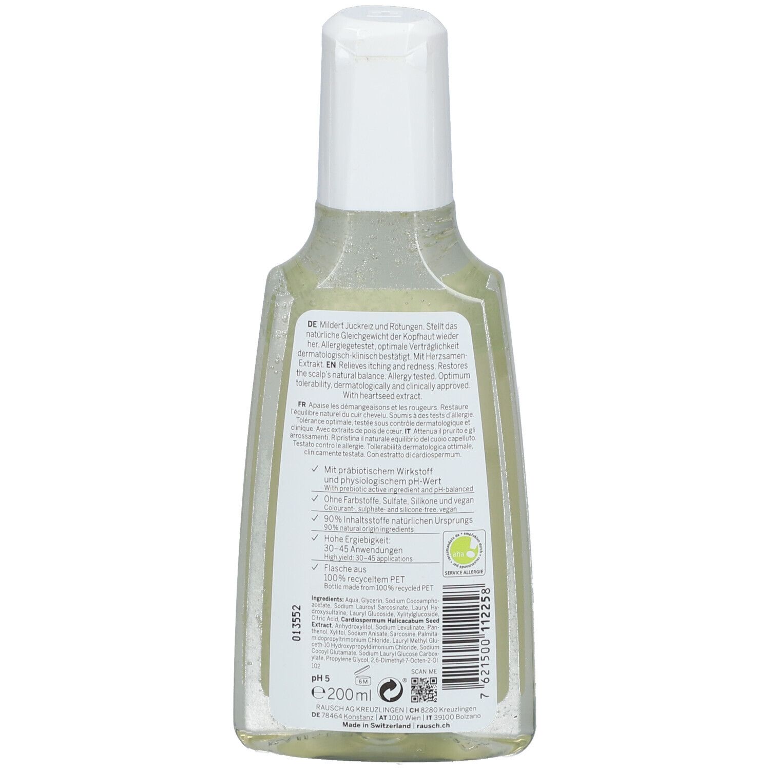 Achterkant van een shampoo fles. Tekstinformatie in het Duits, Frans en Engels. Ingrediënten en fabrikant informatie.