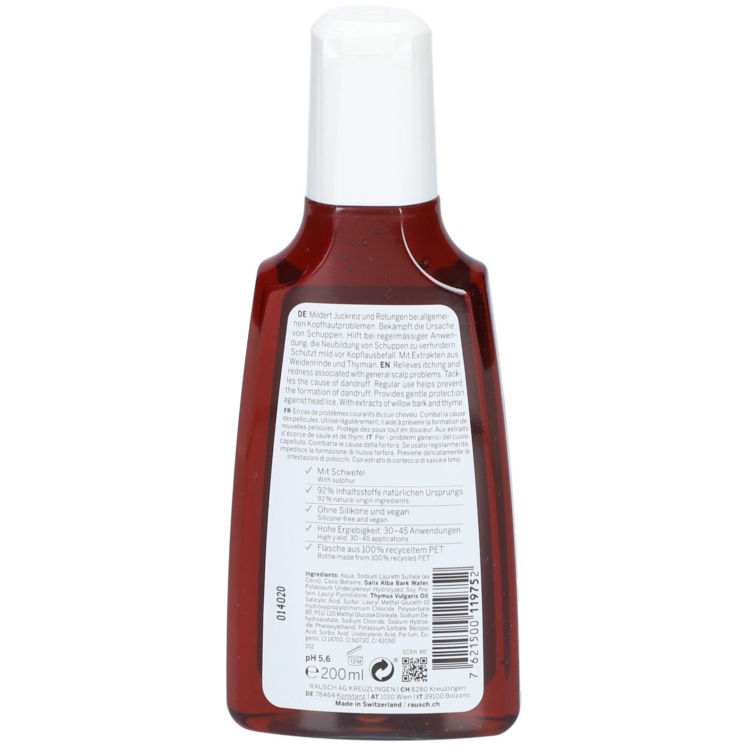 Achterkant van de bruine fles met witte dop. Tekstinformatie. Zwitserse kruiden cosmetica.