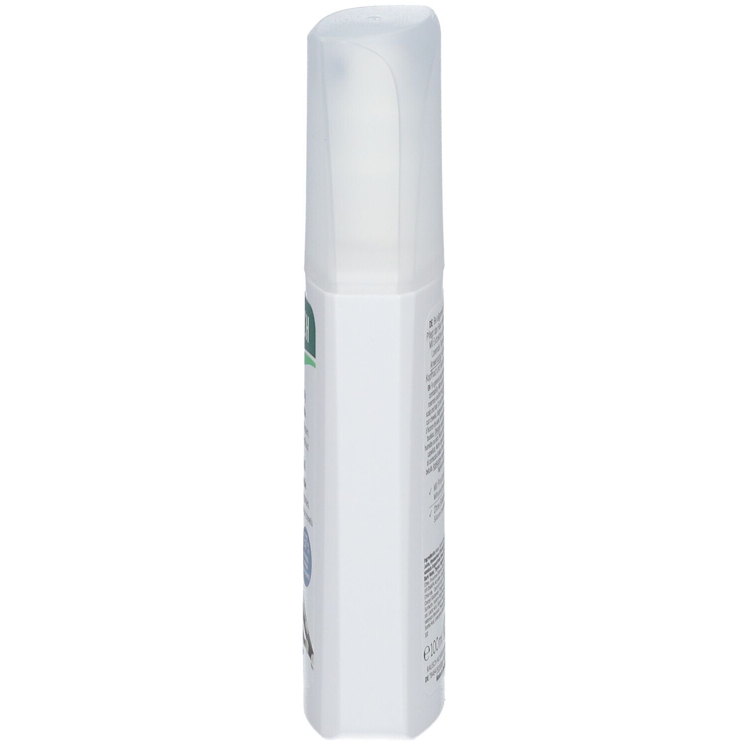 Spray blanc avec bouchon transparent. Vue latérale. Texte sur l'étiquette.