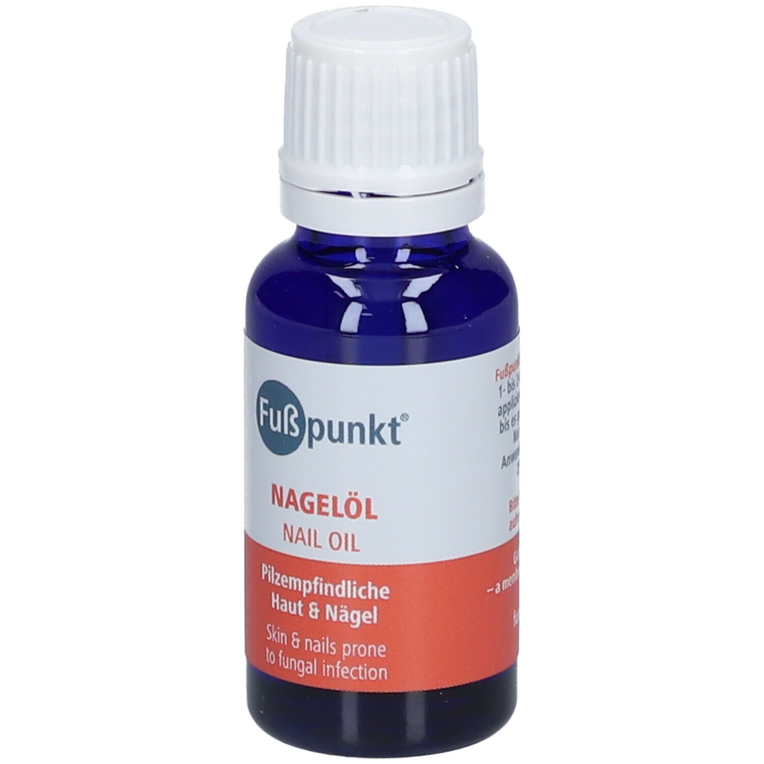Blauwe fles met witte dop. Etiket met productnaam Nagelöl en informatie over huid & nagels.