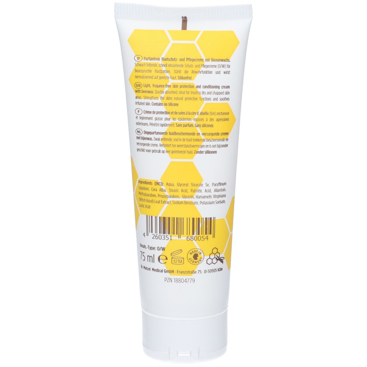 Dos du tube avec texte et ingrédients. Design en nid d'abeilles jaune. Inscription : 75 ml, labels de qualité.