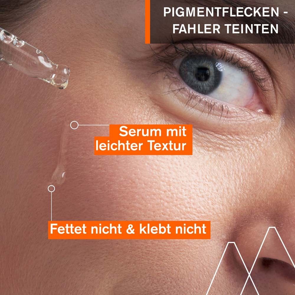 Dos du flacon de sérum. Texte: Booster anti-taches. Développé et recommandé par les dermatologues.
