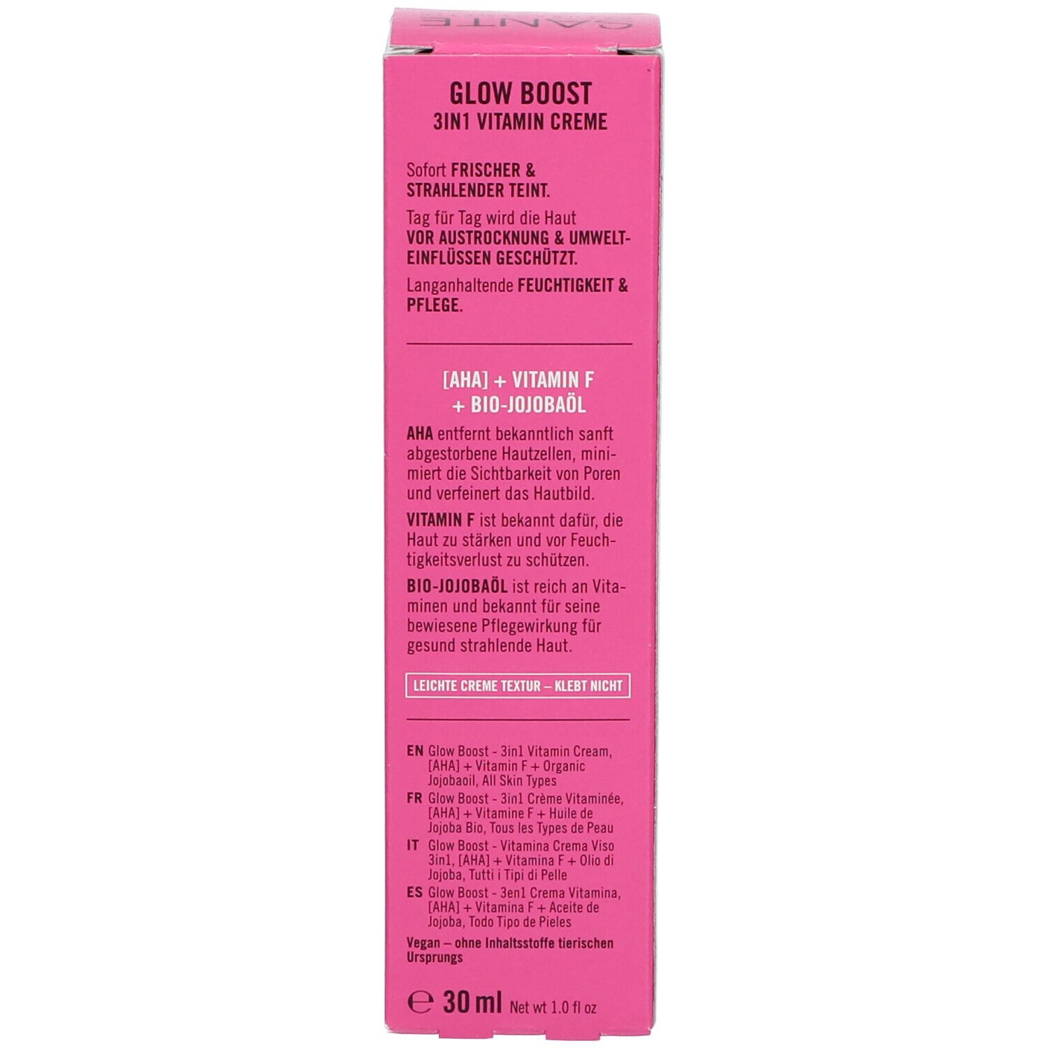 Côté de l'emballage de la crème SANTE GLOW BOOST. Inscription : GLOW BOOST 3in1 Vitamin Creme. Contient AHA, Vitamine F, huile de jojoba bio. 30 ml.