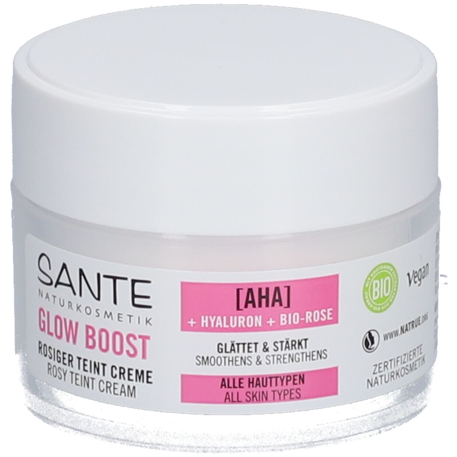 Crèmepot met witte deksel en etiket. Tekst: SANTE, GLOW BOOST, ROSIGER TEINT CREME. Bevat AHA, Hyaluron, Bio-Roos. Vegan.