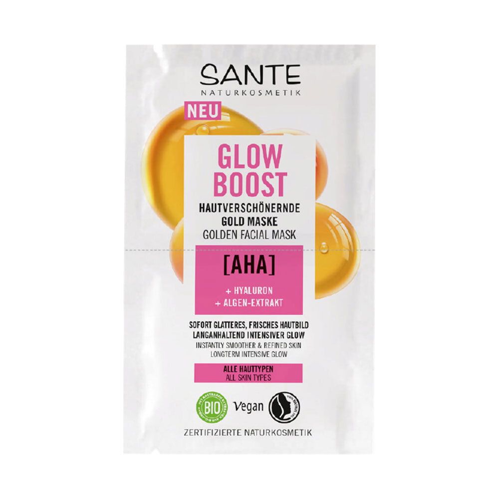 Zakje met gouden gezichtsmasker. Tekst: GLOW BOOST, HUIDVERBETERENDE GOUDEN MASKER, [AHA], + HYALURON + ALGENEXTRACT. Bio- en vegan-zegels.