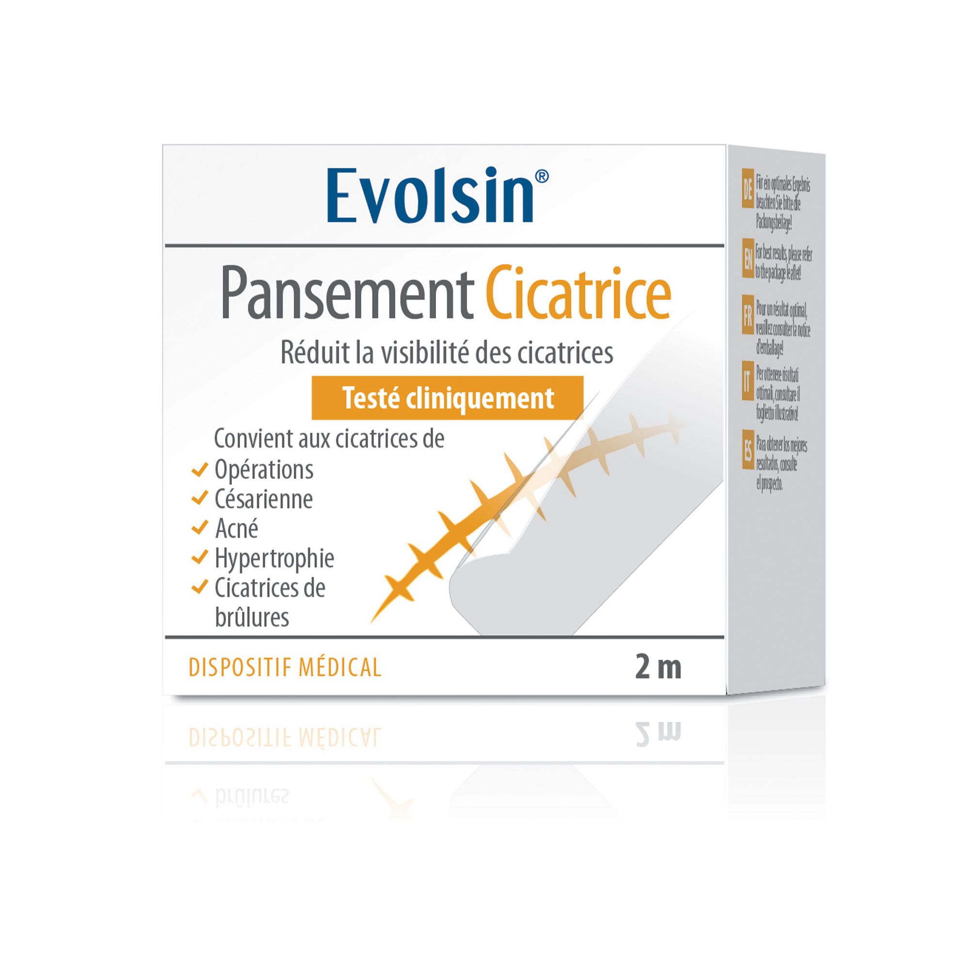 Rouleau de pansement transparent et emballage. Inscription: Evolsin, réduit les cicatrices, testé cliniquement.