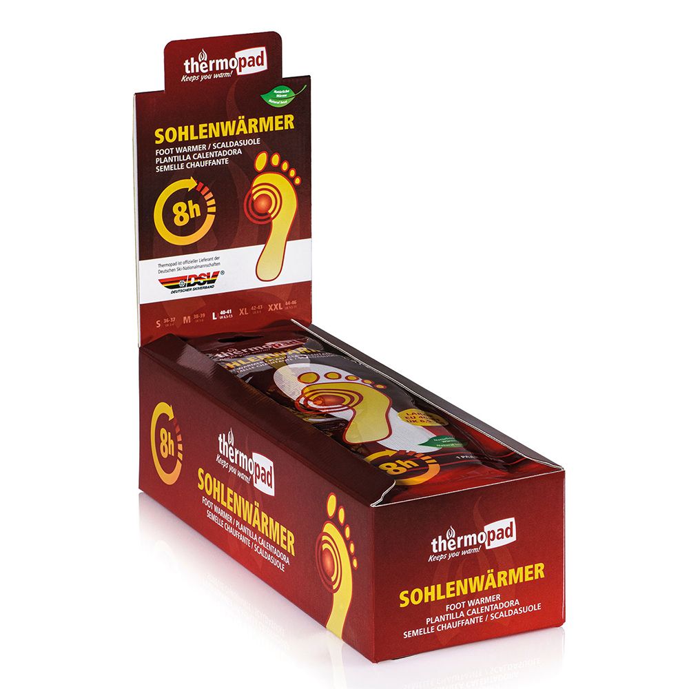 Display met thermopad® Sohlenwärmer. Rode verpakking met productnaam en voetillustratie. 8 uur warmte.