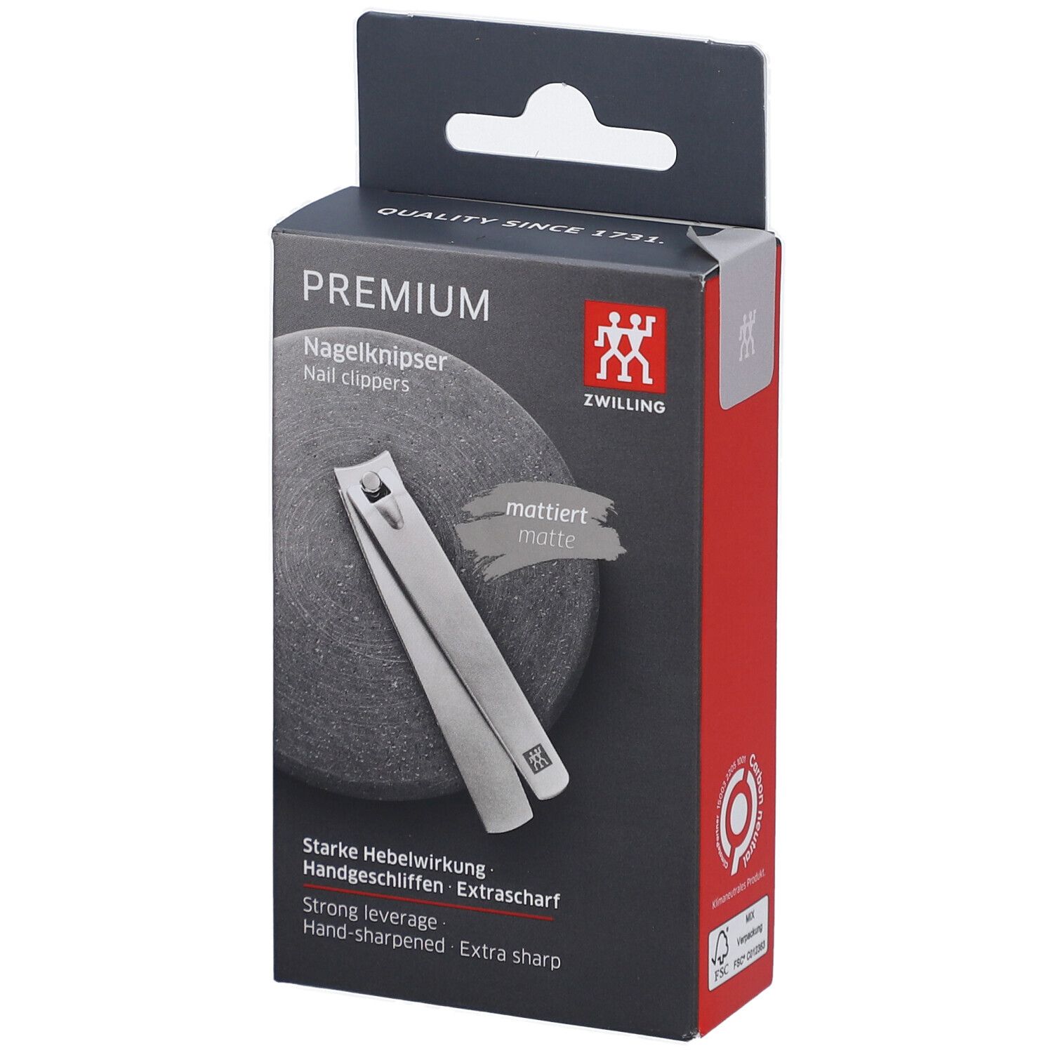 Coupe-ongles dans son emballage. Marque ZWILLING. Produit argenté. Inscriptions: PREMIUM, mat, extra tranchant.