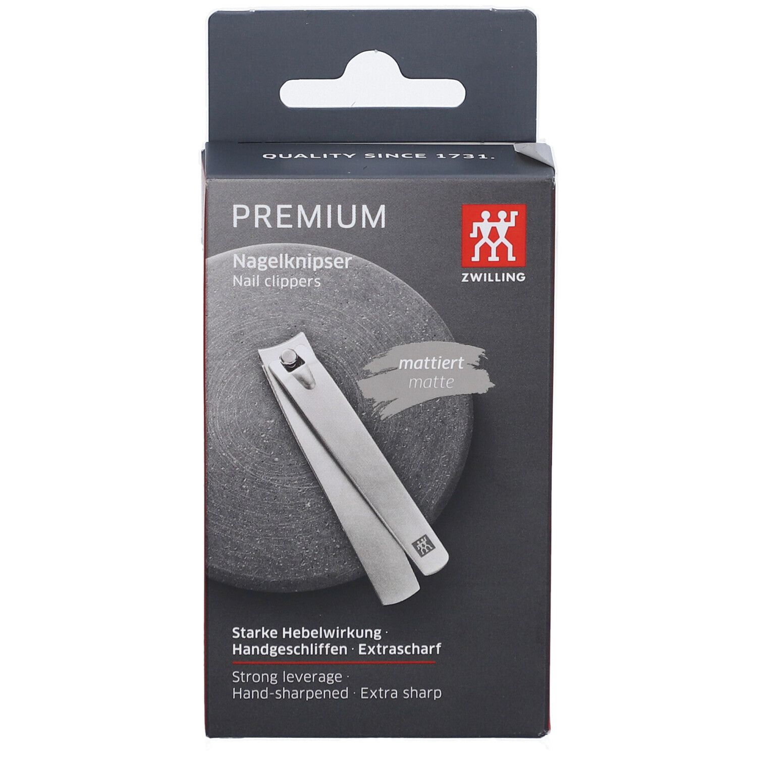 Coupe-ongles dans son emballage. Marque ZWILLING. Produit argenté. Inscriptions: PREMIUM, mat, extra tranchant.