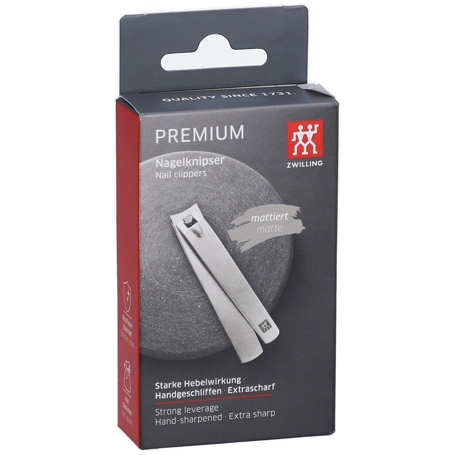 Coupe-ongles dans son emballage. Marque ZWILLING. Produit argenté. Inscriptions: PREMIUM, mat, extra tranchant.