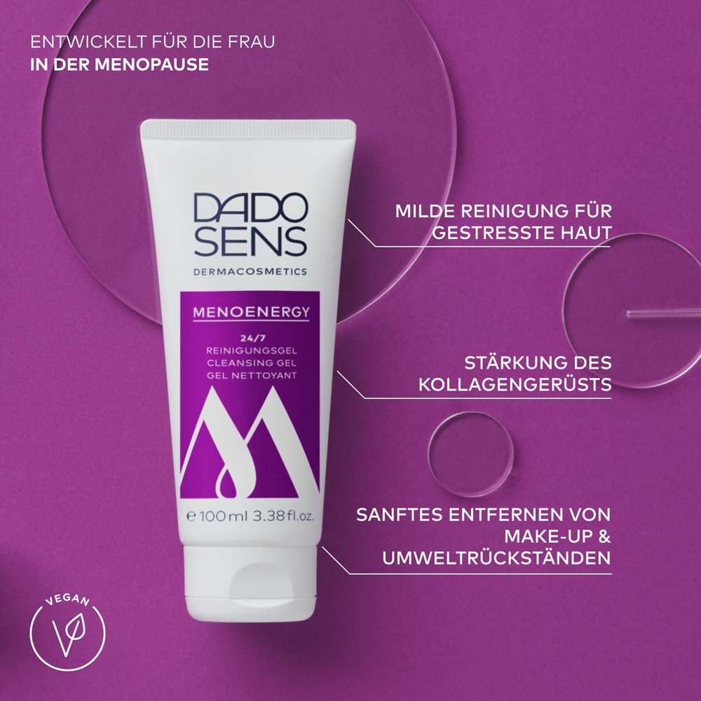 Witte tube met paarse opdruk. Tekst: Menoenergy, reinigingsgel. Merk: DADO SENS. Paarse achtergrond.