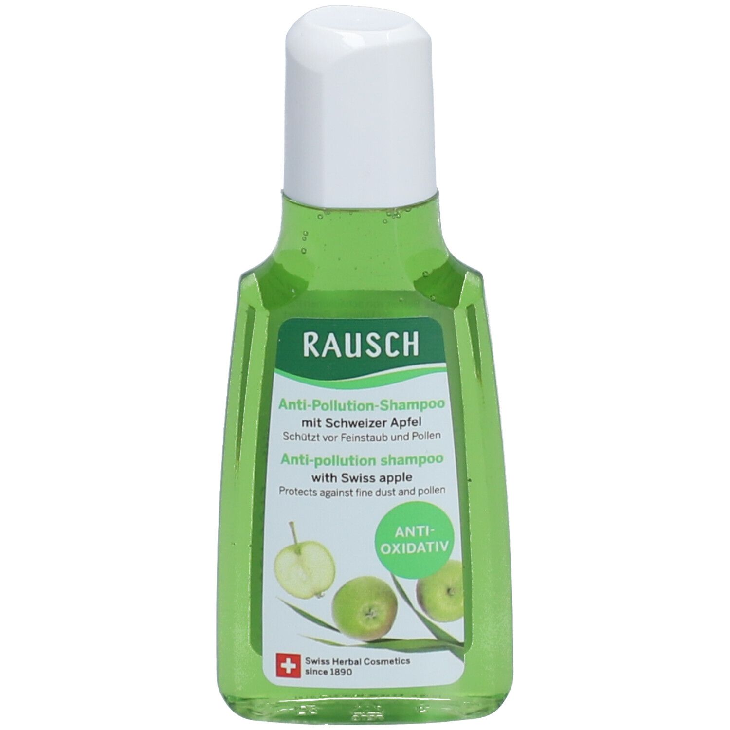 Flacon vert avec bouchon blanc. Inscription: RAUSCH Anti-Pollution-Shampoo. Avec pomme suisse. Anti-oxydant. Cosmétiques aux herbes suisses.