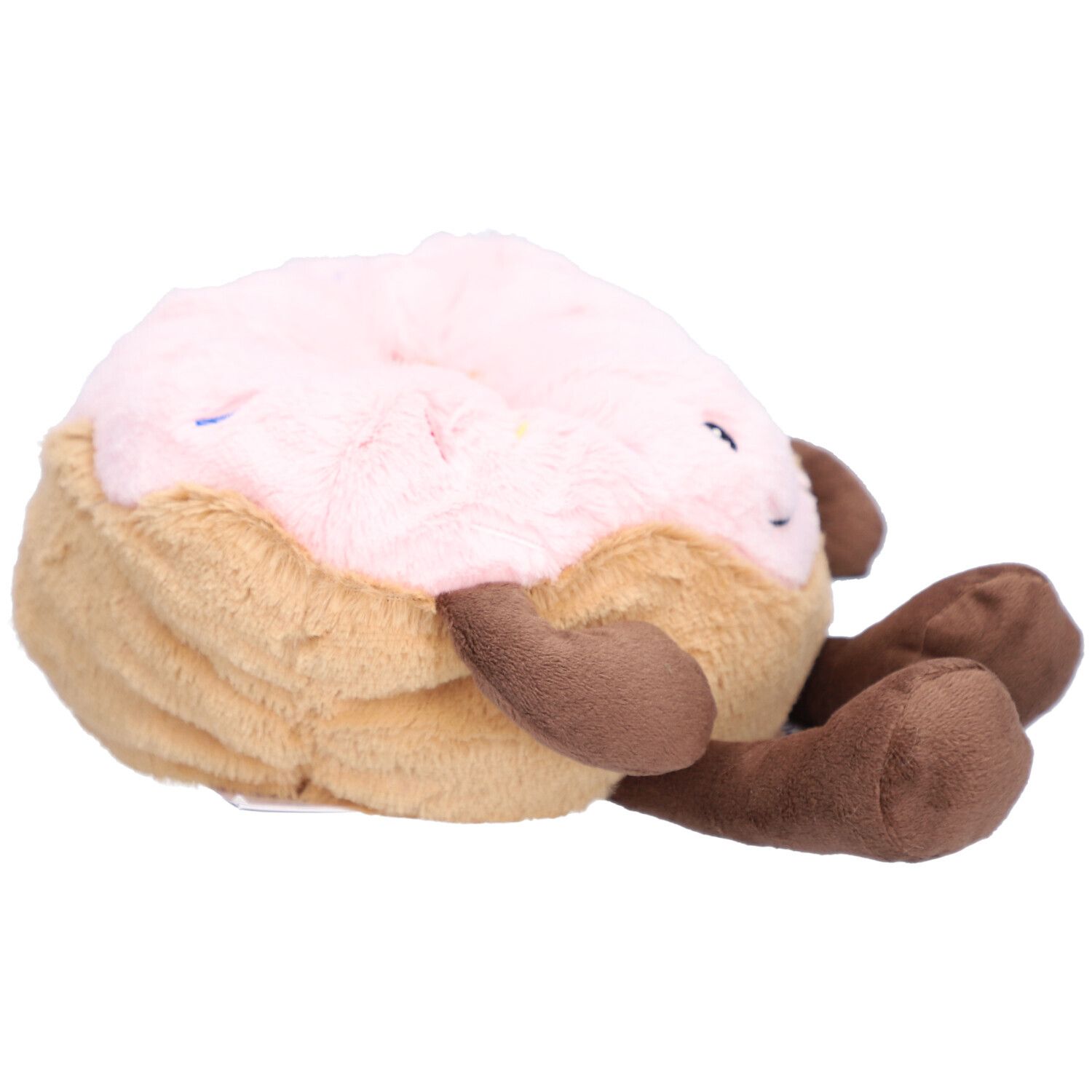 Pluche donut met roze glazuur, van de zijkant gezien.