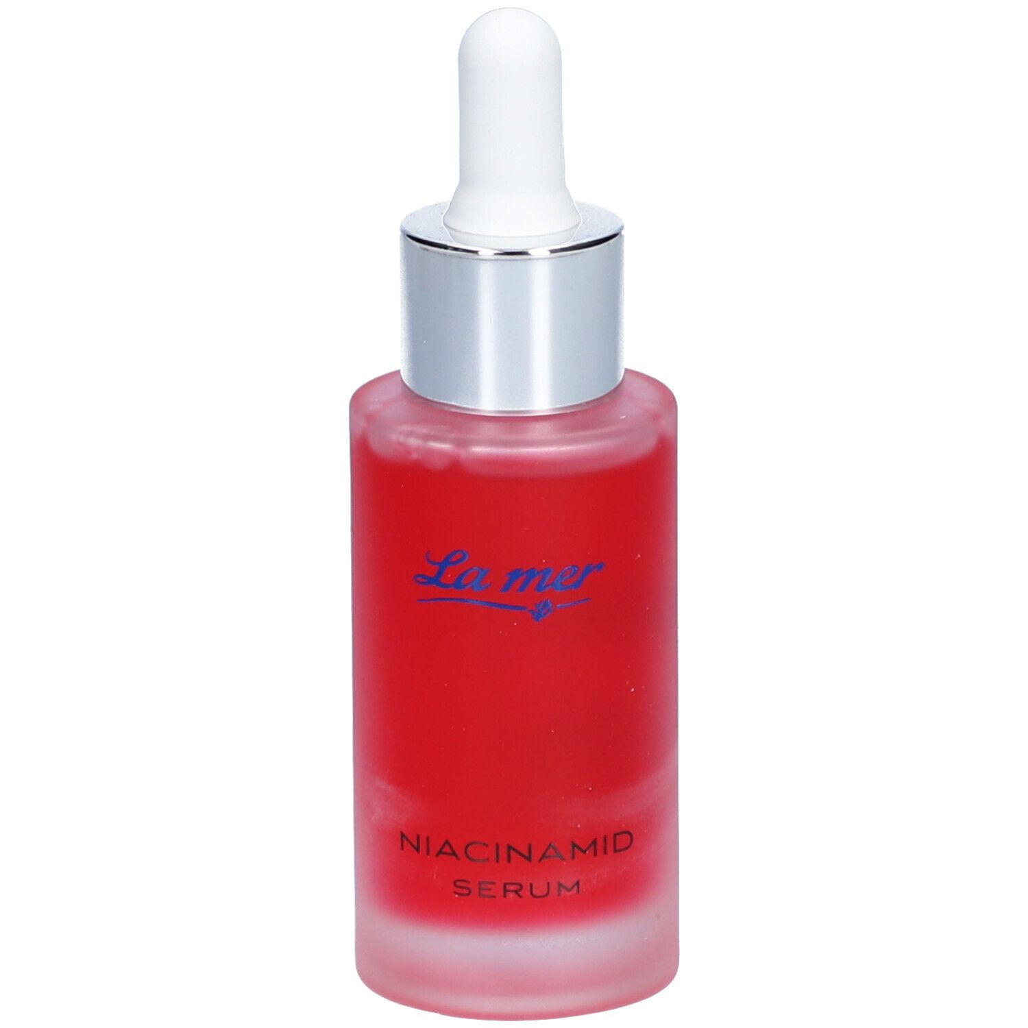Flacon de sérum rouge avec pipette. Inscription : La mer, Niacinamid Serum.