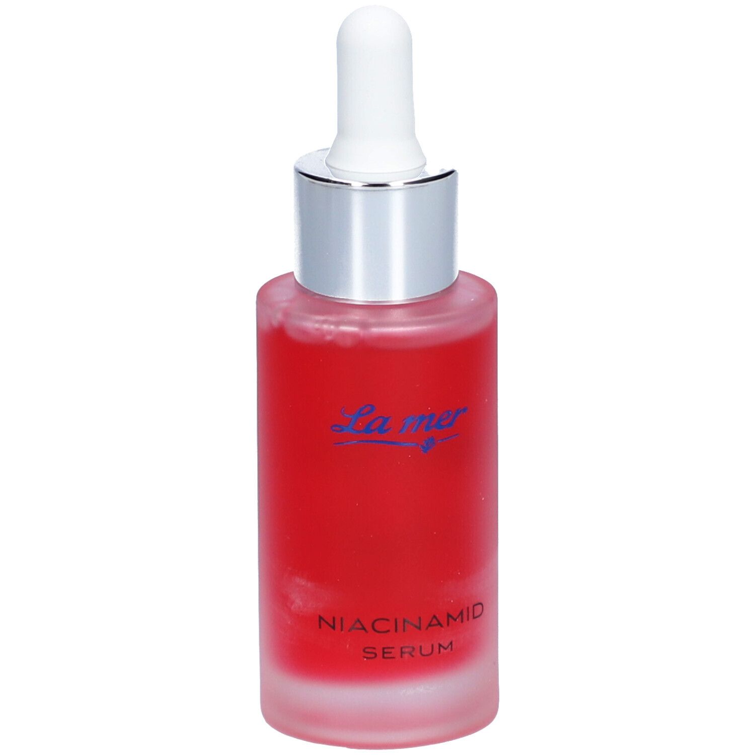 Flacon de sérum rouge avec pipette. Inscription : La mer, Niacinamid Serum.