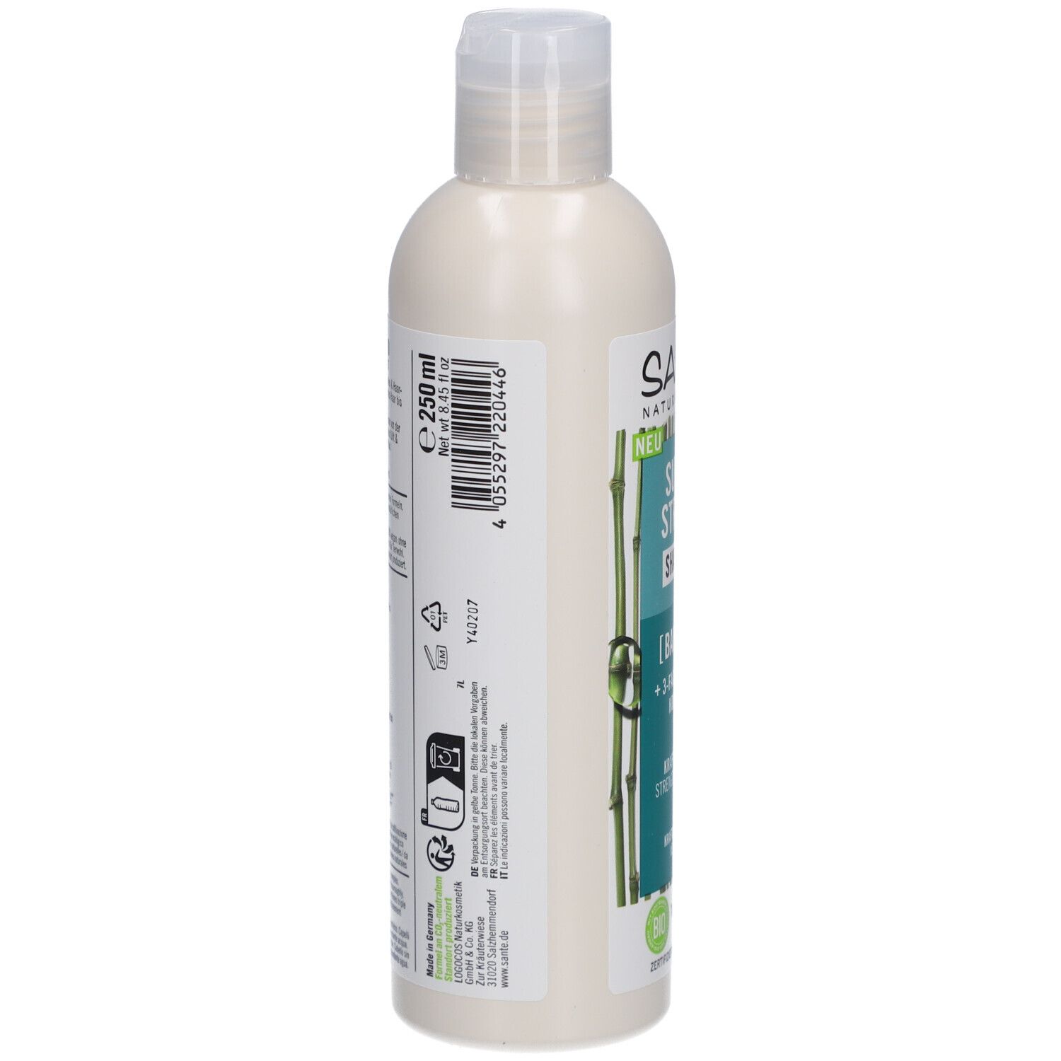 Dos de la bouteille de shampooing SANTE. Bouteille blanche avec texte et symboles. Contient des informations sur les ingrédients et le recyclage.