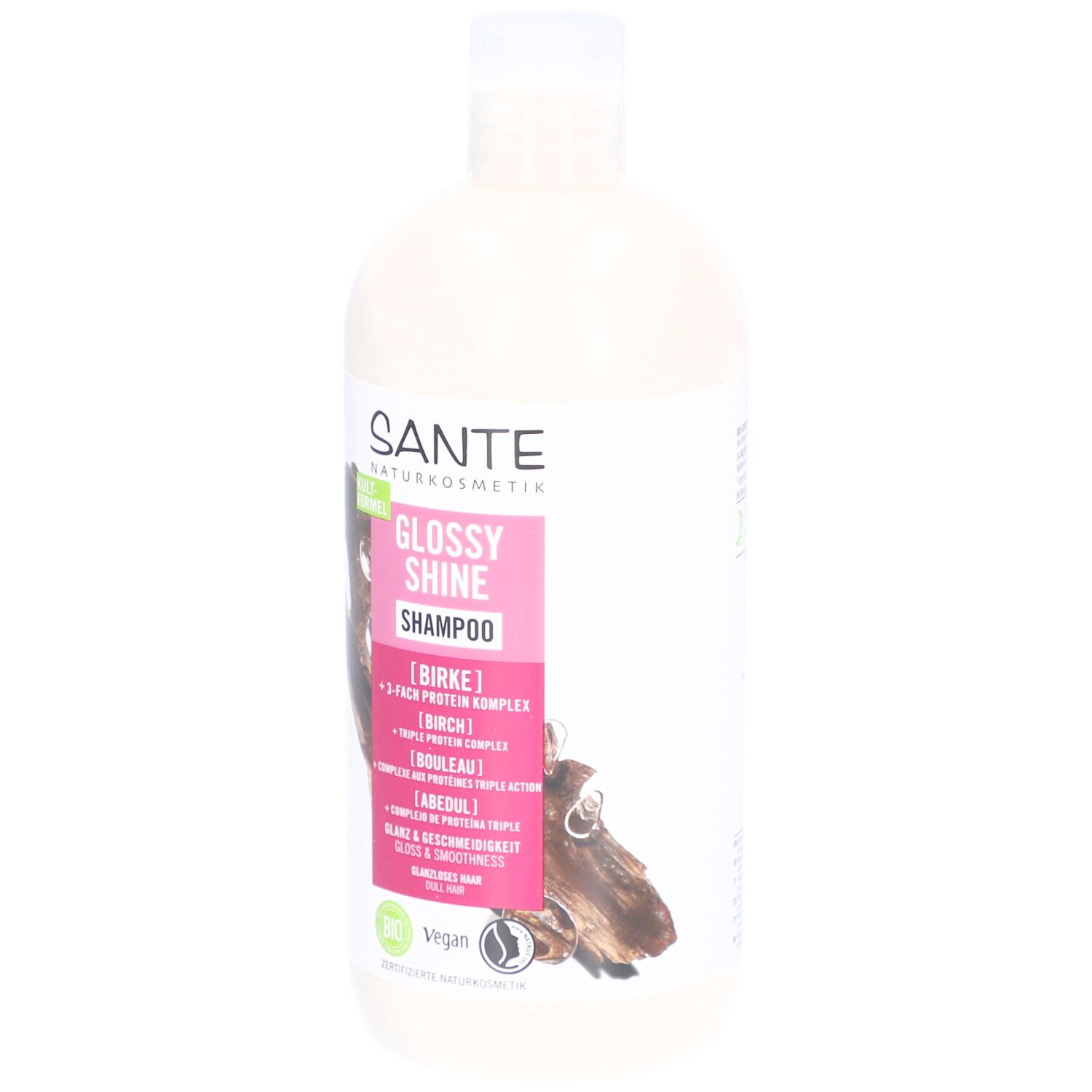 Flacon de shampooing avec bouchon blanc. Étiquette rose avec nom et logo du produit. Label vegan.