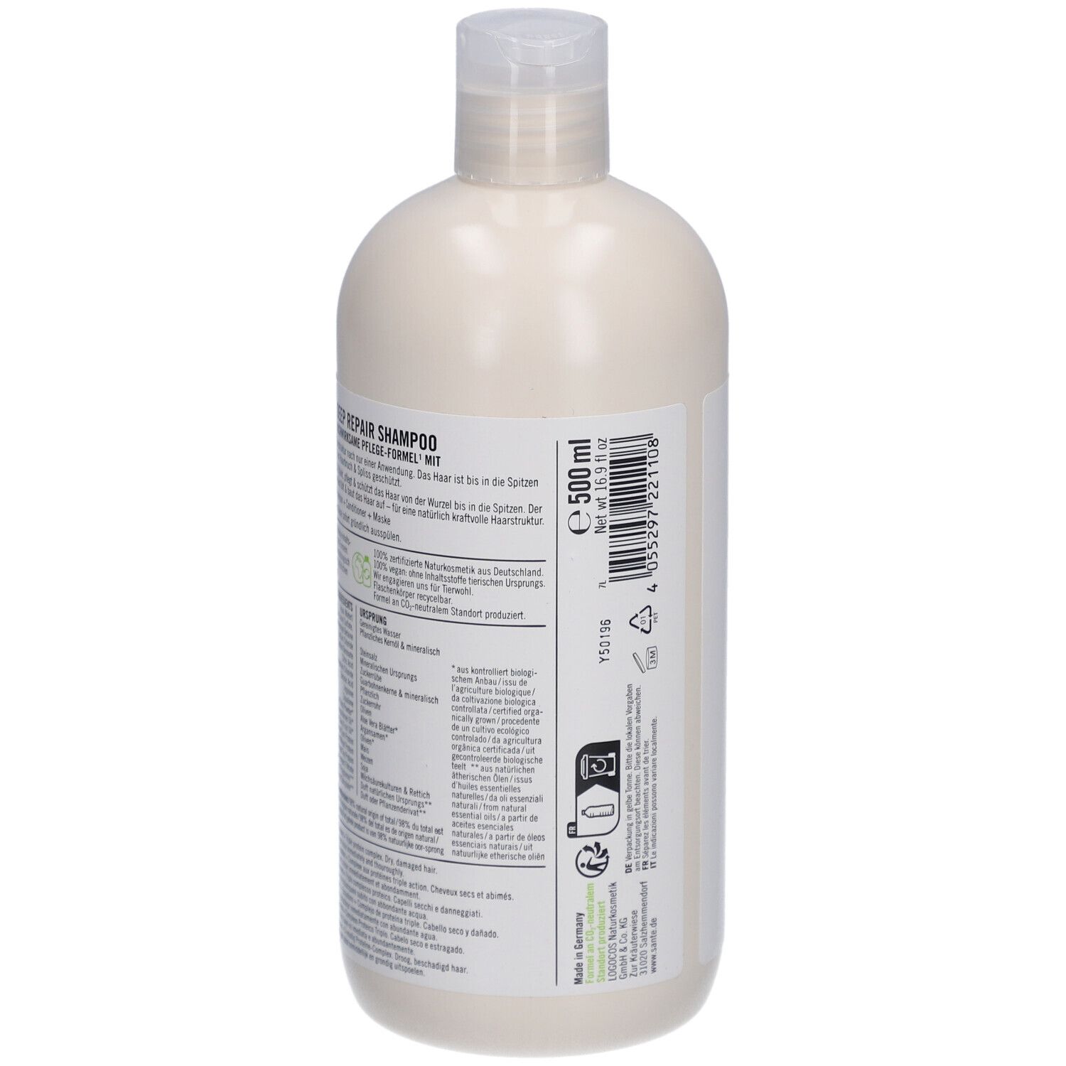 Dos d'un flacon de shampooing beige avec bouchon blanc. Inscription: 500 ml. Texte multilingue.