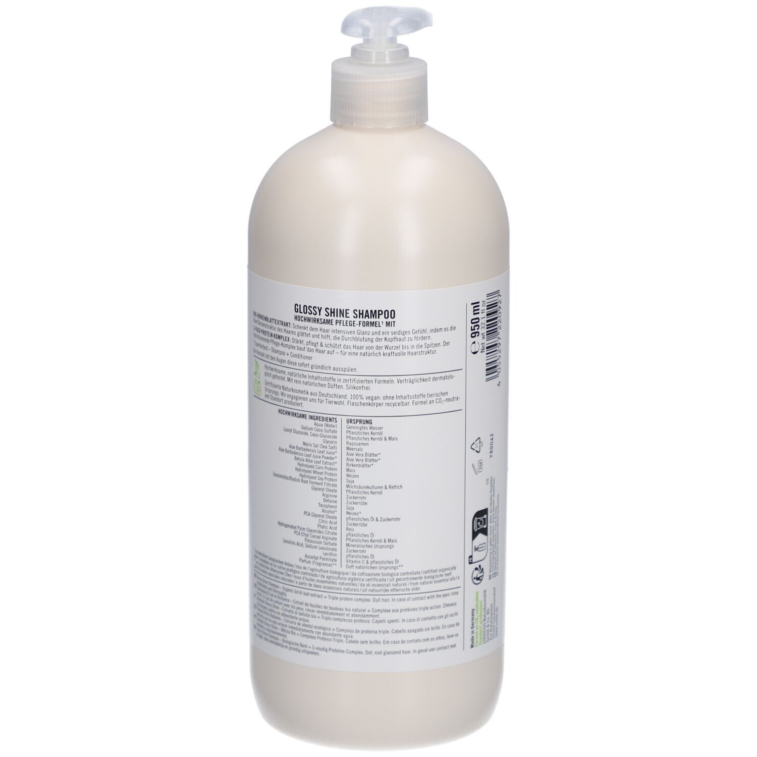 Flacon de shampooing beige avec pompe. Vue arrière avec étiquette et informations produit. Label Vegan visible.