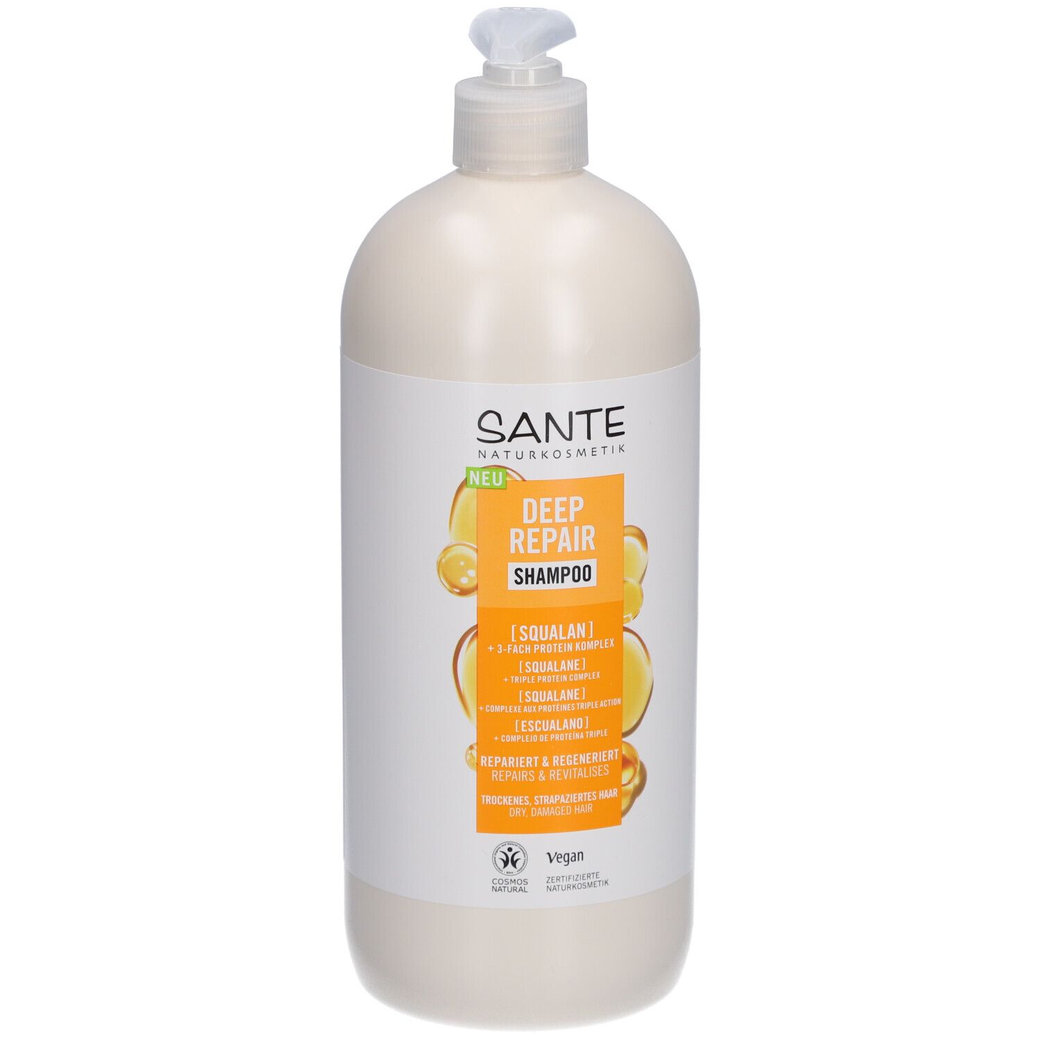 Flacon de shampooing beige avec pompe. Étiquette avec SANTE, DEEP REPAIR Shampoo, Squalane et logo Vegan.