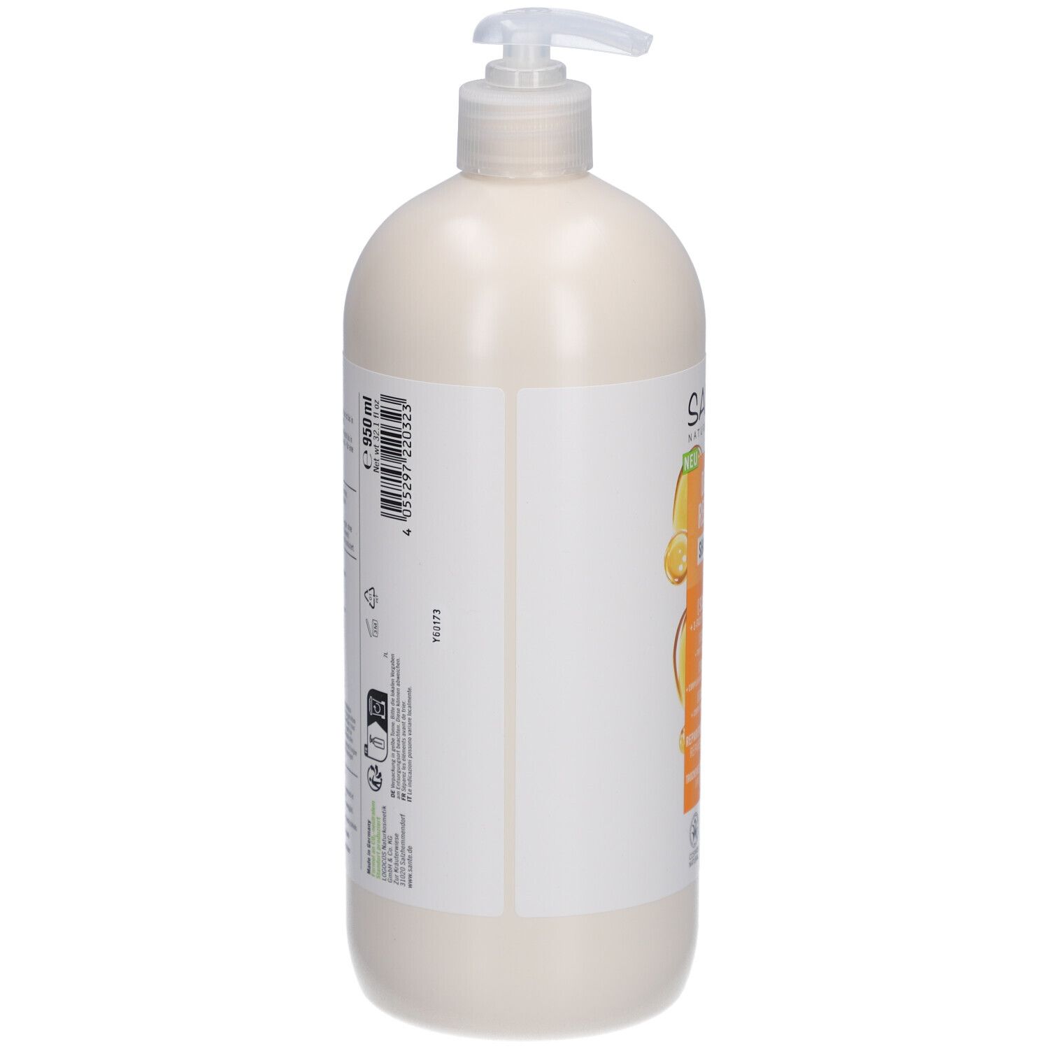 Flacon de shampooing beige avec pompe. Dos avec texte et logos. Contient 950 ml.
