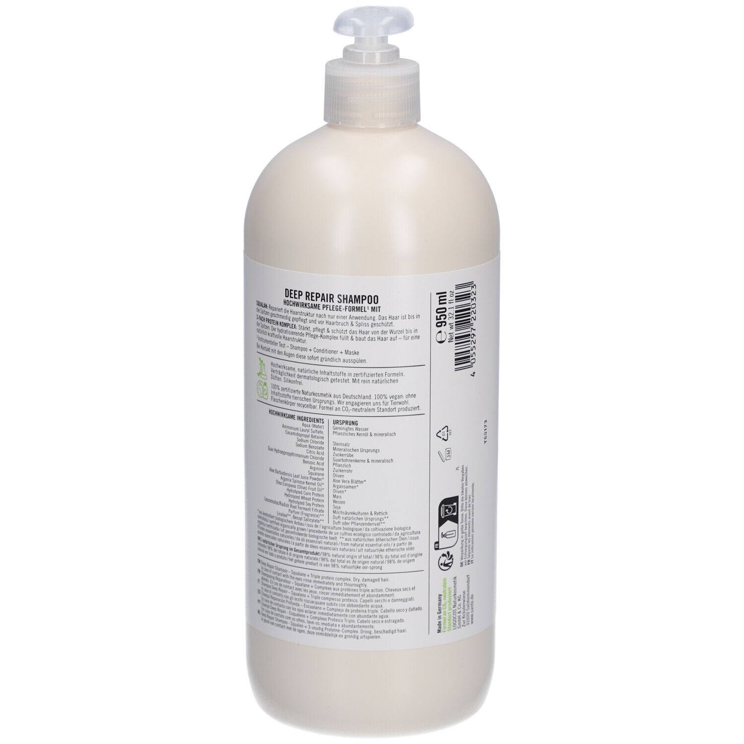 Flacon de shampooing beige avec pompe. Dos avec texte, ingrédients et logos. Contient 950 ml.