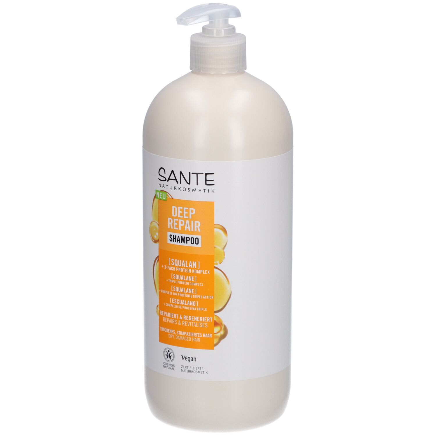 Flacon de shampooing beige avec pompe. Étiquette avec SANTE, DEEP REPAIR Shampoo, Squalane et logo Vegan.