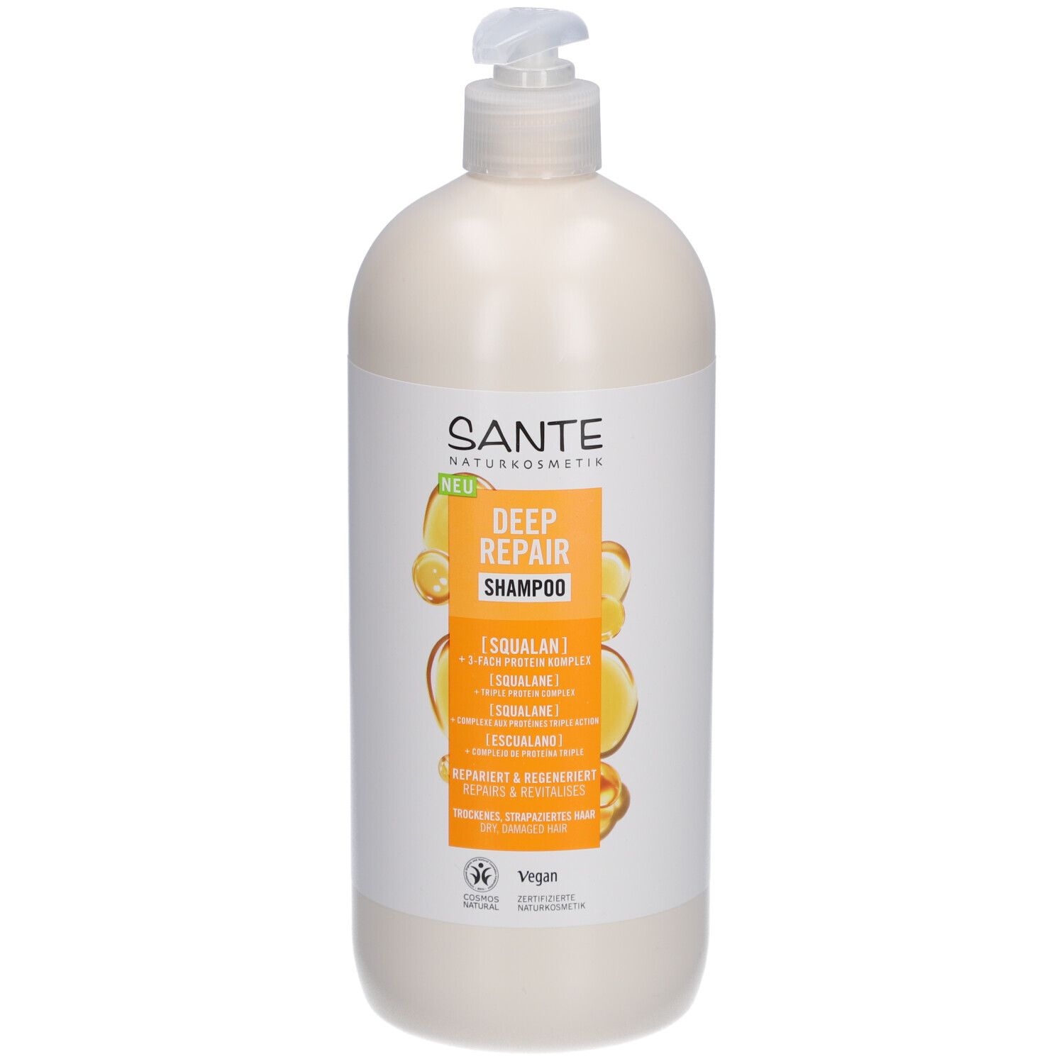 Flacon de shampooing beige avec pompe. Étiquette avec SANTE, DEEP REPAIR Shampoo, Squalane et logo Vegan.