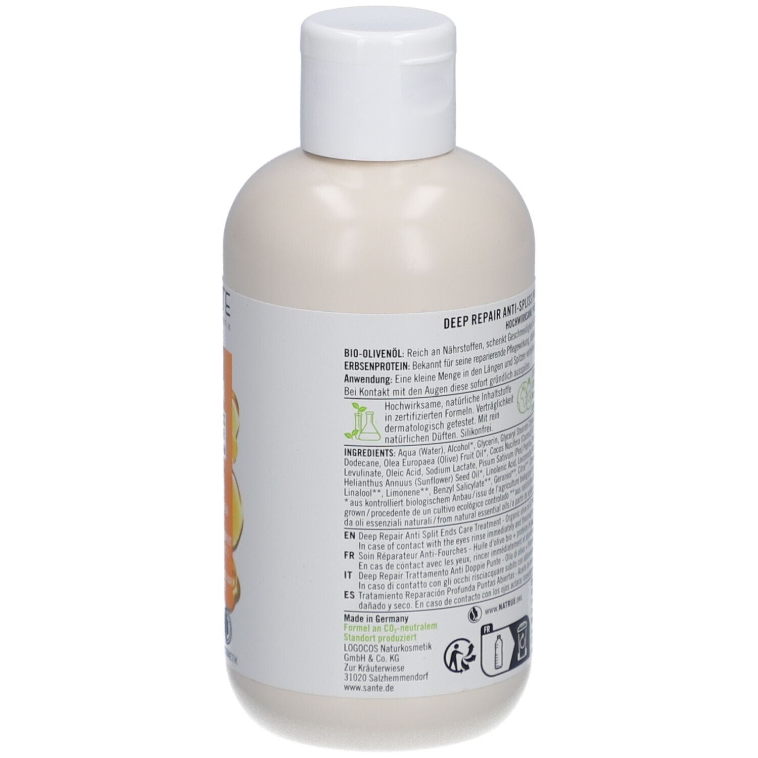Achterkant van de fles met ingrediëntenlijst en fabrikantgegevens.