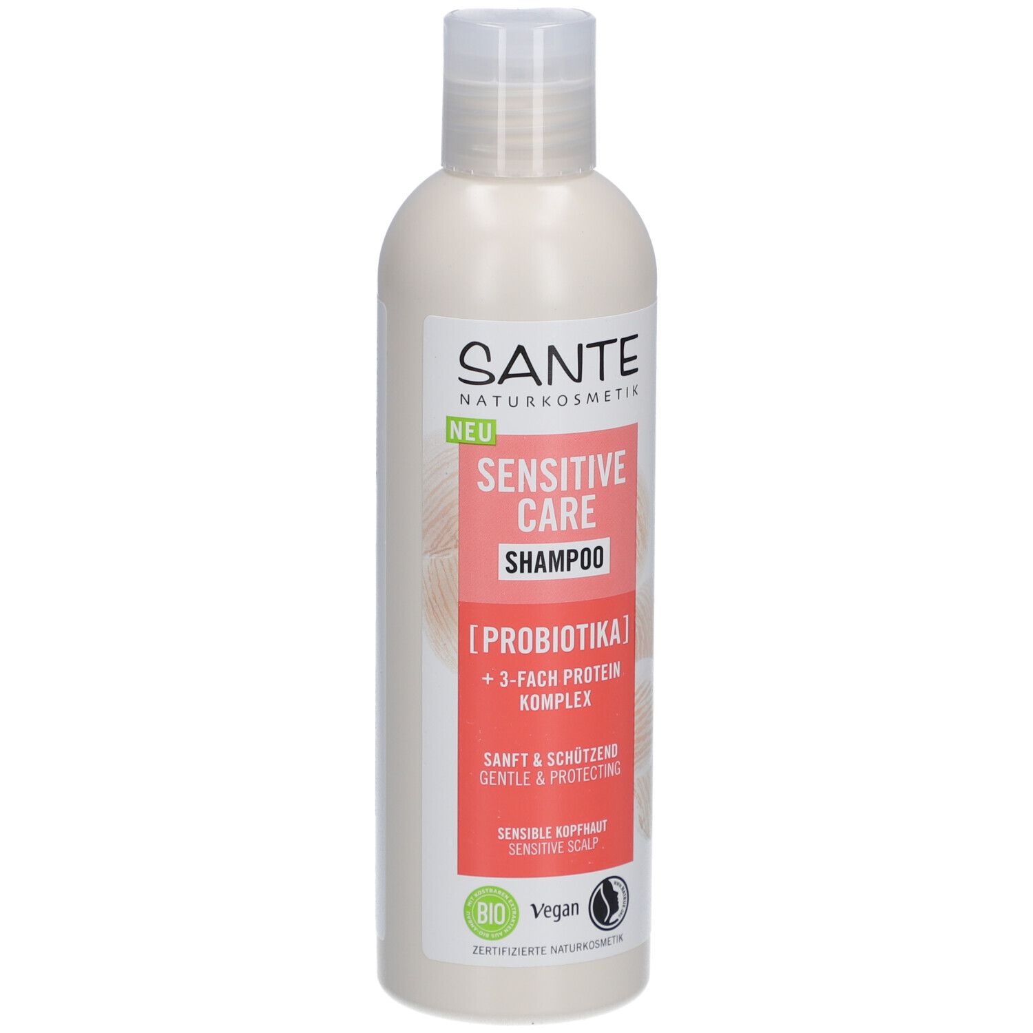 Shampooing SANTE Sensitive Care. Bouteille de shampooing blanc avec bouchon blanc et étiquette rouge. Texte: Sensitive Care Shampoo, [Probiotika].
