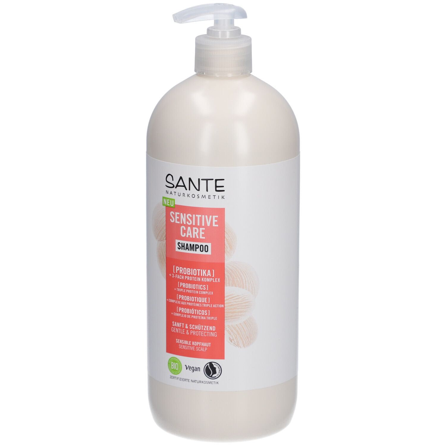 Flacon de shampooing beige avec pompe. Inscription: SANTE Sensitive Care Shampoo. Labels bio et vegan.
