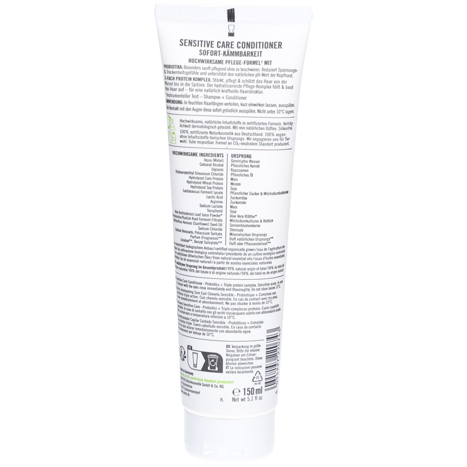 Dos d'un tube blanc. Texte avec ingrédients et instructions. Label Vegan et symboles de recyclage.