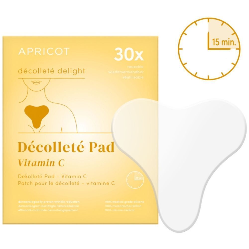 Verpakking met decolletépad en klok. Pad in hartvorm, wit. Verpakking met productnaam en vitamine C.