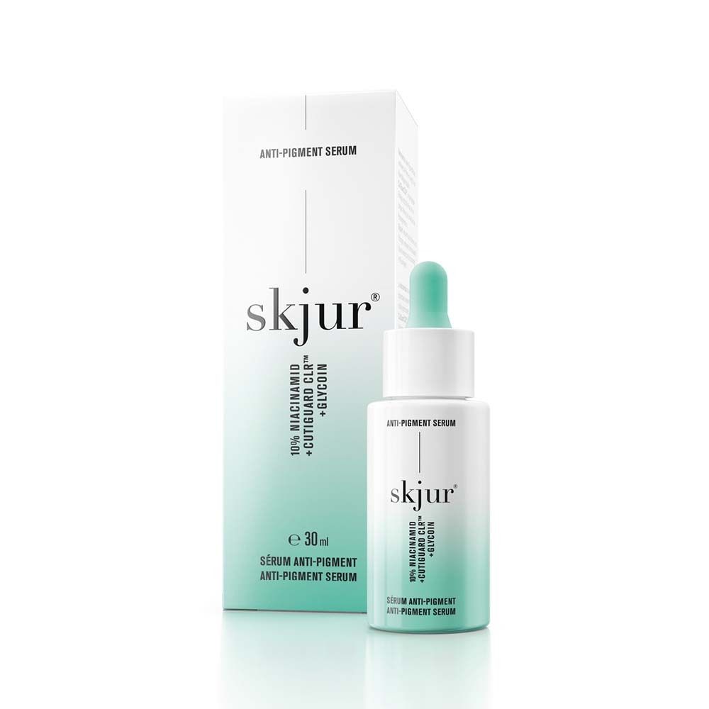 Sérum anti-pigmentaire skjur®. Flacon et emballage. Blanc, turquoise. Avec pipette.