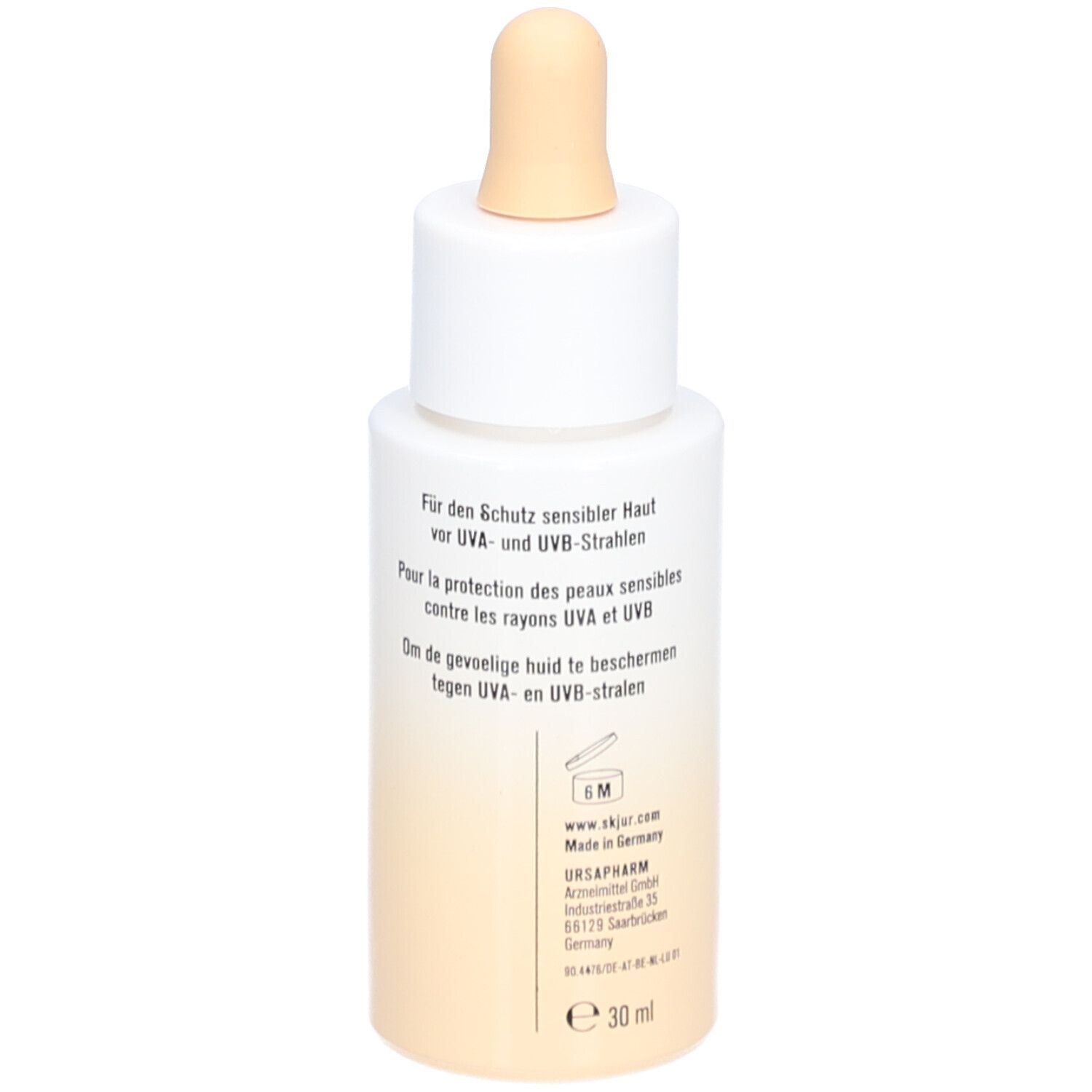 Achterkant van de fles. Tekst voor gevoelige huid tegen UVA- en UVB-stralen. 30 ml.