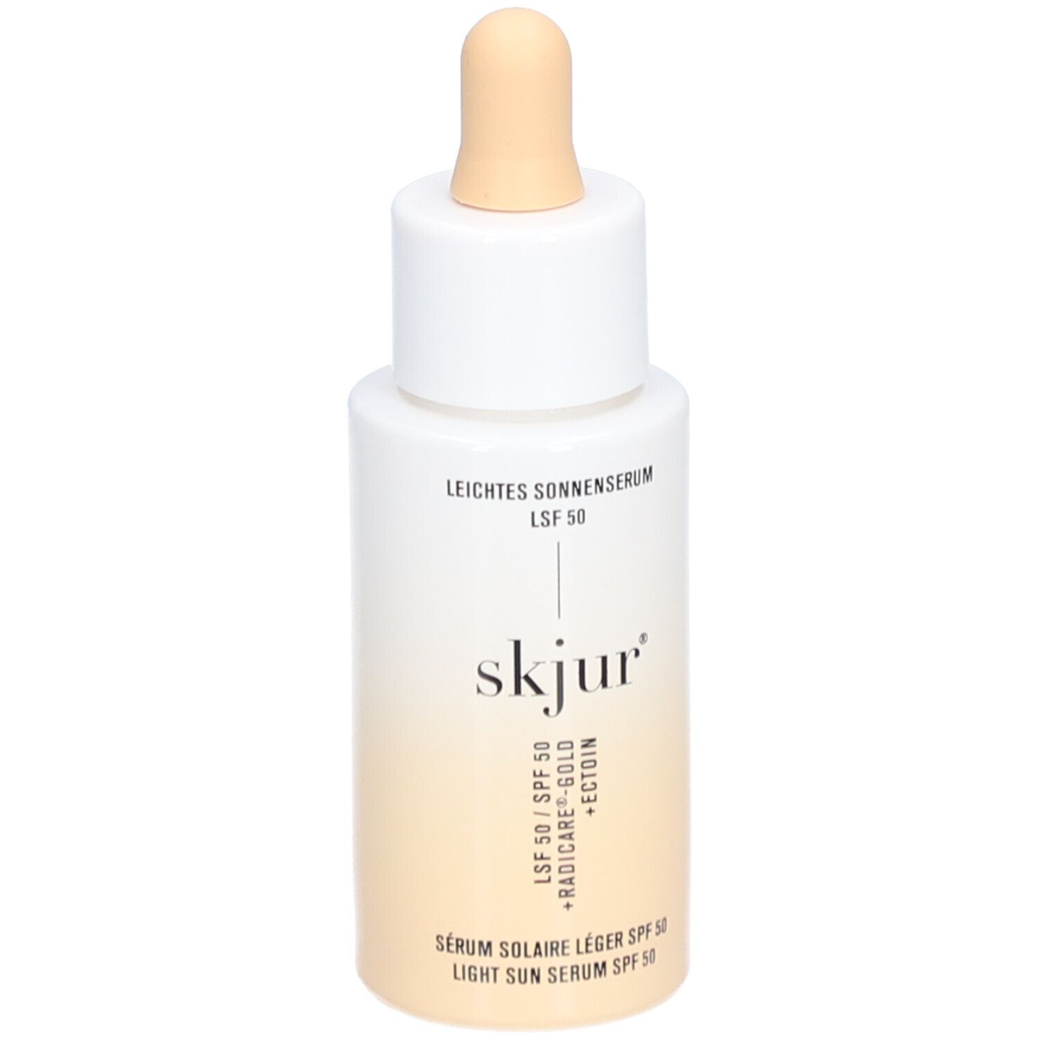 Wit-beige fles met pipet. Opschrift: Leichtes Sonnenserum LSF 50, skjur, Sérum solaire léger SPF 50, Light Sun Serum SPF 50.