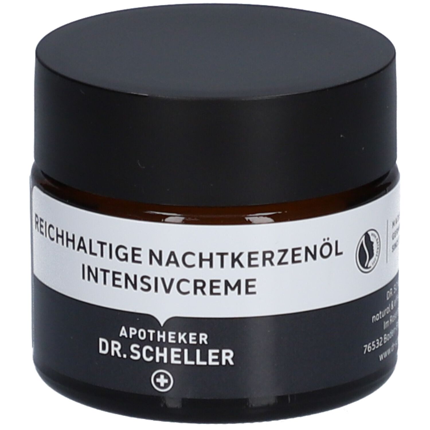 Pot de crème brun avec couvercle noir. Nom du produit sur étiquette blanche. Label vegan.
