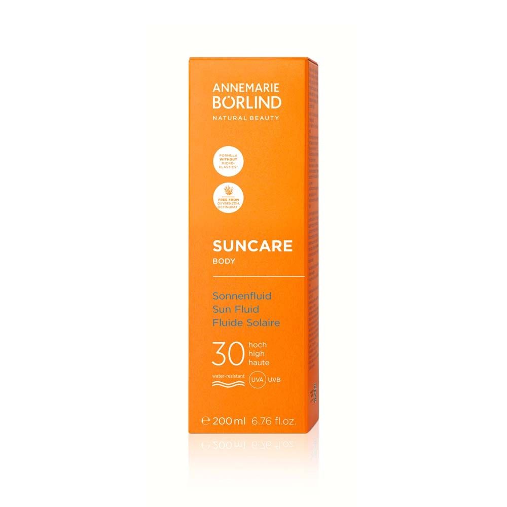 Emballage de fluide solaire LSF 30 Annemarie Börlind. Orange, avec image du produit.