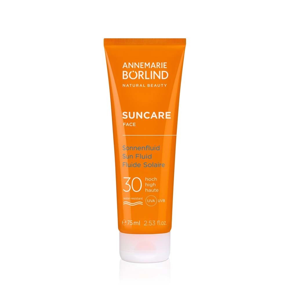 Tube orange de fluide solaire LSF 30. Marque : ANNEMARIE BÖRLIND. Texte : Suncare Face.