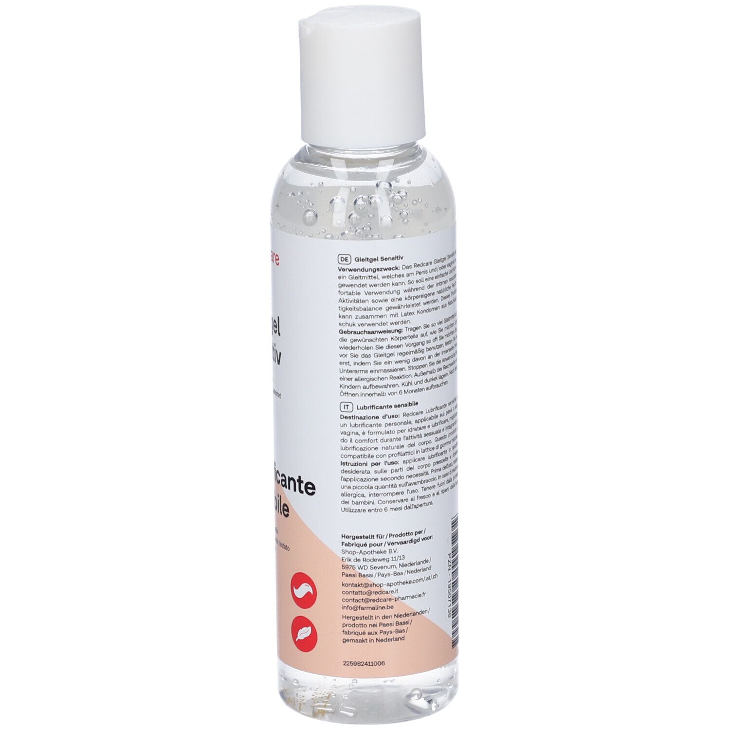 Achterkant van de fles. Etiket met productinformatie, ingrediënten en fabrikantgegevens. Meertalige tekst.